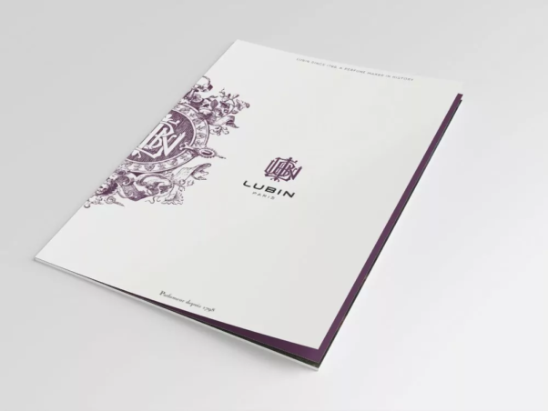 Brochure White Lubin Paris avec un design de studio violet orné et un logo sur la couverture. Limbus Studio