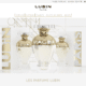 Les flacons de parfum Lubin Paris sont élégamment présentés sur un fond blanc minimaliste, incarnant la sophistication du design du studio. Limbus Studio