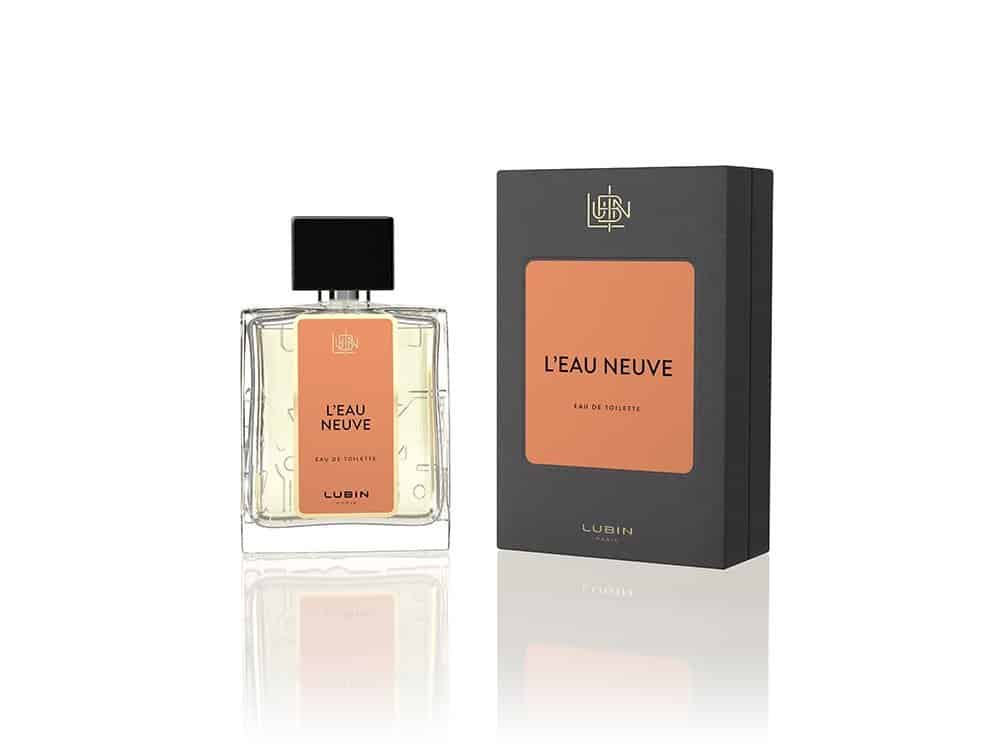 Un flacon de parfum magnifiquement conçu étiqueté « L'Eau Neuve » avec une boîte assortie, tous deux illustrant le design exquis de Lubin. Limbus Studio